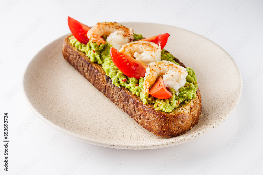 delicious Italian bruschetta with shrimps on a white background delicious Italian bruschetta with shrimps on a white background