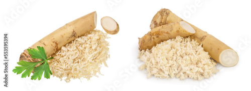 Horseradish root with slices grated pile and parsley isolated on white background photo