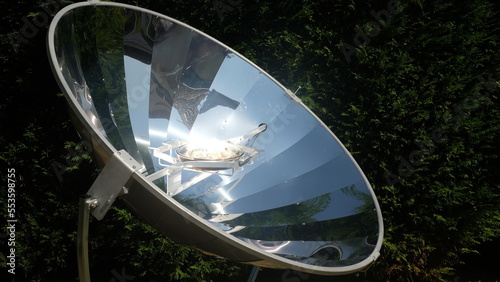 Parabolic solar cooker concentrating the sunlight