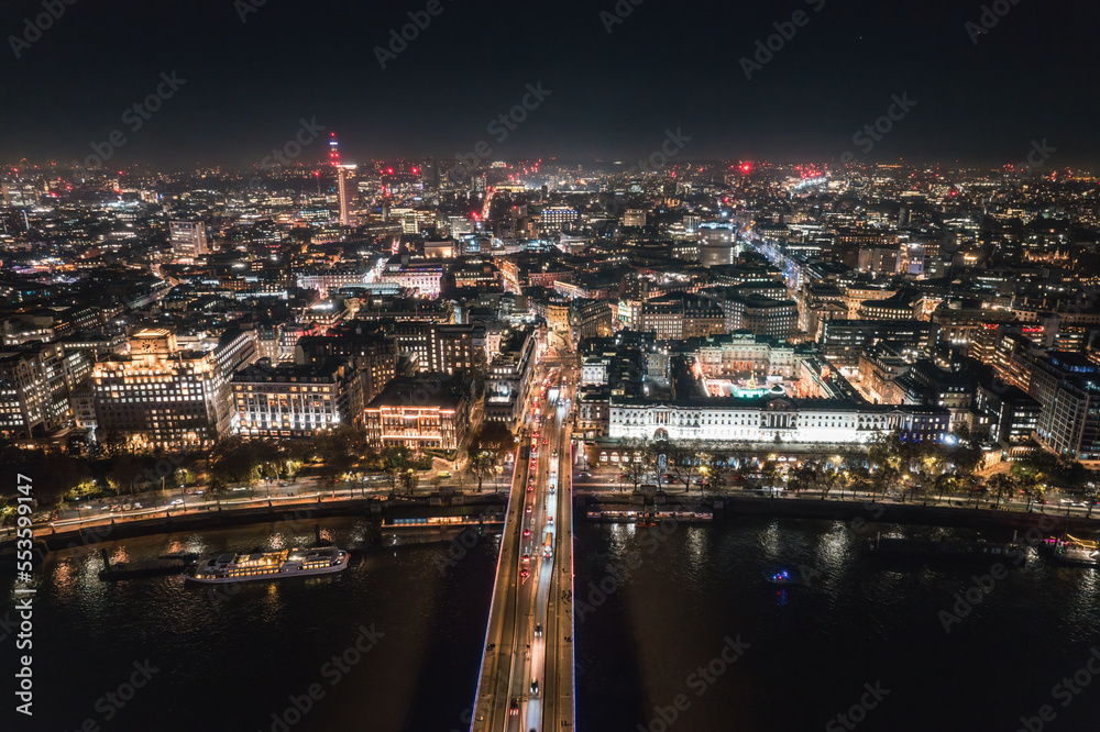 Obraz premium Epic night aerial view of the London, River Thames, London Eye, Westminster. Panorama cityscape