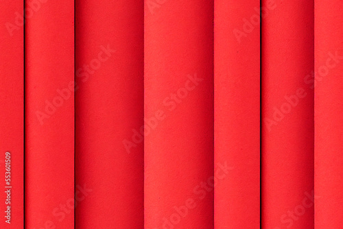 Vertical shot of red paper sheets abstract background Generative AI