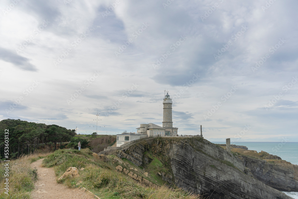 Fantastic cloudscape of the Cabo Mayor lighthouse in Santander, Spain
