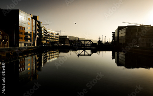 Industrial view foggy morning Cork Irealnd modern building  photo