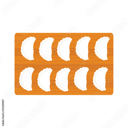 Dumplings on a wooden cutting board
