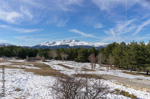 Mountain scenery and very white snow in the Sierra de Canencia, Madrid, on a completely clear day. Spain