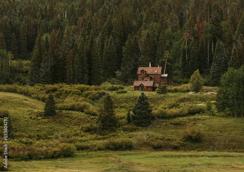 Lone cabin on a mountainside