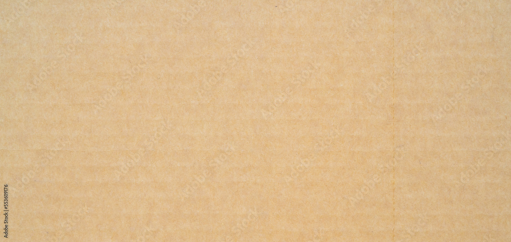 smooth brown cardboard paper, full frame, close up. background and texture of brown paper corrugated sheet board surface smooth brown cardboard paper, full frame, close up. background and texture of brown paper corrugated sheet board surface