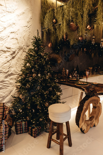 Christmas decor in the kitchen in a vintage style.  gingerbread house and cookies