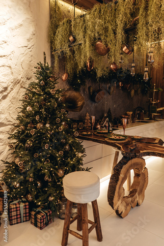 Christmas decor in the kitchen in a vintage style.  gingerbread house and cookies