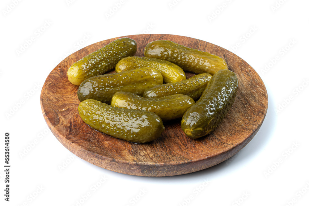 Fototapeta premium Pickled Cucumbers on Wood Plate Isolated, Fermented, Marinated Vegetables, Gherkins