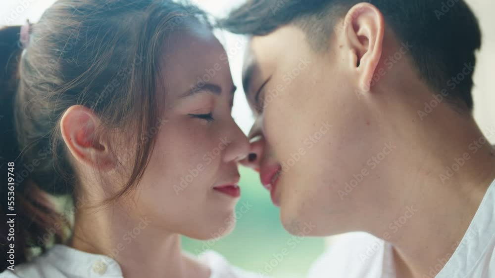 Young adult asia people fiance happy lover flirt fall in love nose lips kiss hug cuddle care trust. Sweet comfort touch newlywed asian couple life man smile look at woman face relax warm time dating. Young adult asia people fiance happy lover flirt fall in love nose lips kiss hug cuddle care trust. Sweet comfort touch newlywed asian couple life man smile look at woman face relax warm time dating.