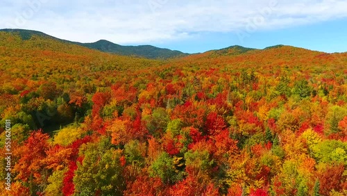 Aerial flying over stunning Vermont peak fall hills and mountains photo