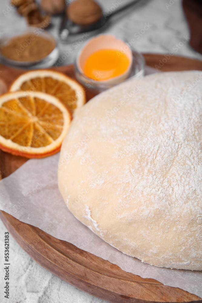 Fresh dough and ingredients on white table, closeup Fresh dough and ingredients on white table, closeup