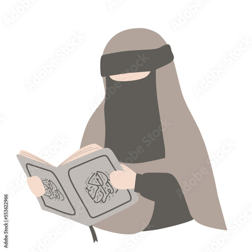 Woman wearing hijab and niqab reading holy quran photo
