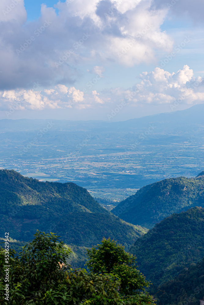 Overlapping mountains and blue sky