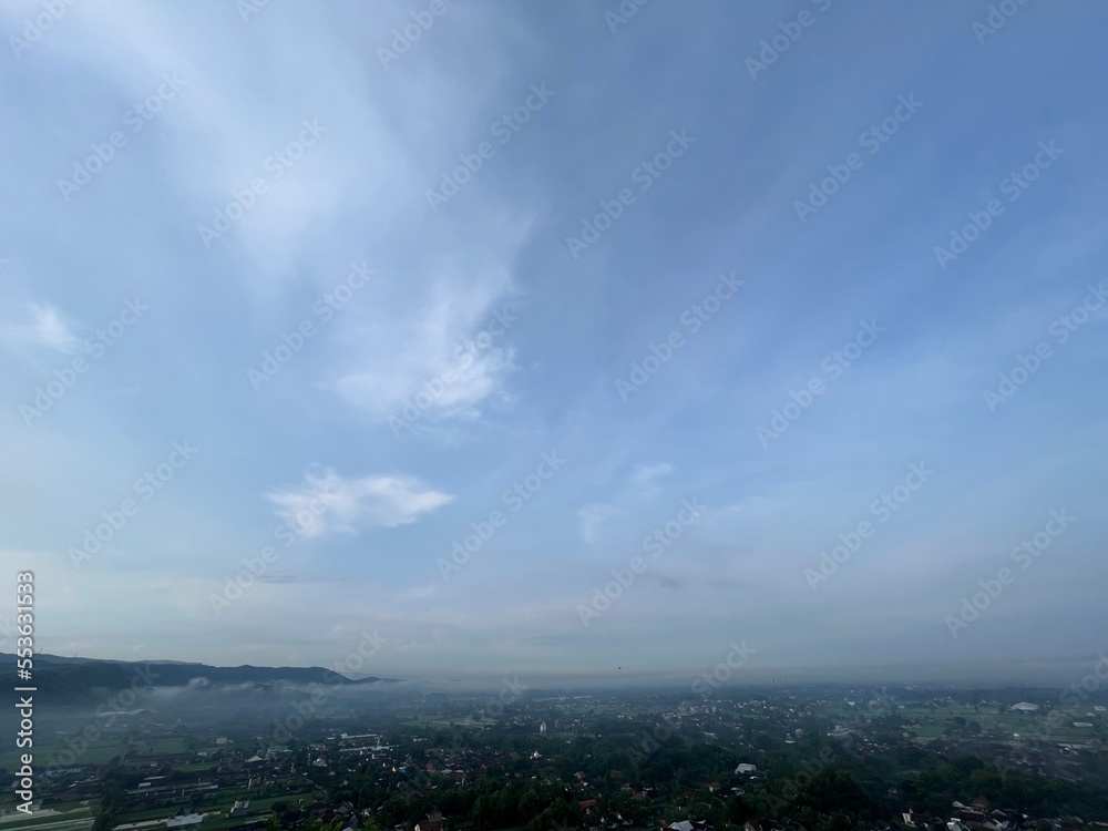 Beautiful aerial view from the top of Gunung Wamgi which is one of tourism destination in Yogyakarta, Indonesia. Photo shows established communities and nature. Beautiful aerial view from the top of Gunung Wamgi which is one of tourism destination in Yogyakarta, Indonesia. Photo shows established communities and nature.