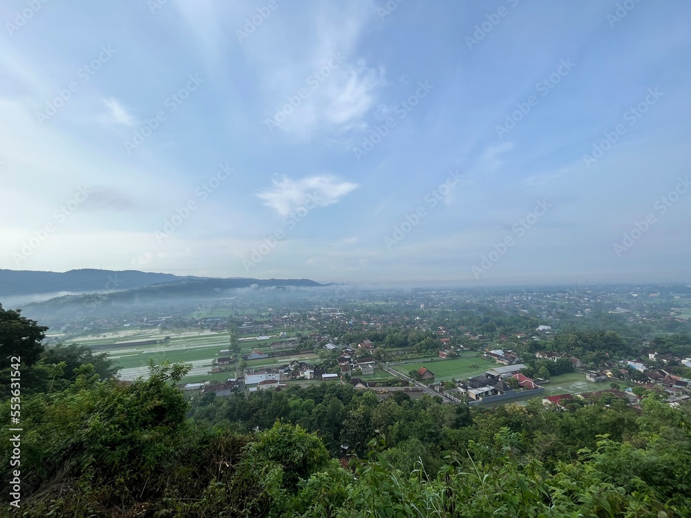 Beautiful aerial view from the top of Gunung Wamgi which is one of tourism destination in Yogyakarta, Indonesia. Photo shows established communities and nature.