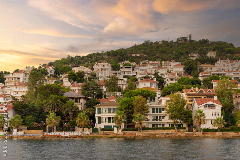 View of the mountains of Kinaliada island from Marmara Sea, with traditional summer houses and boats, Istanbul, Turkey View of the mountains of Kinaliada island from Marmara Sea, with traditional summer houses and boats, Istanbul, Turkey