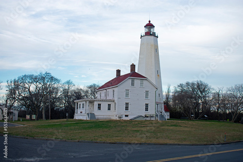 Lighthouse in Sandy Hook, New Jersey, in a late autumn cloudy afternoon, with the light turned off -80