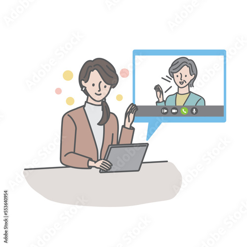 タブレットを使って母（義母）とビデオ通話をする若い女性