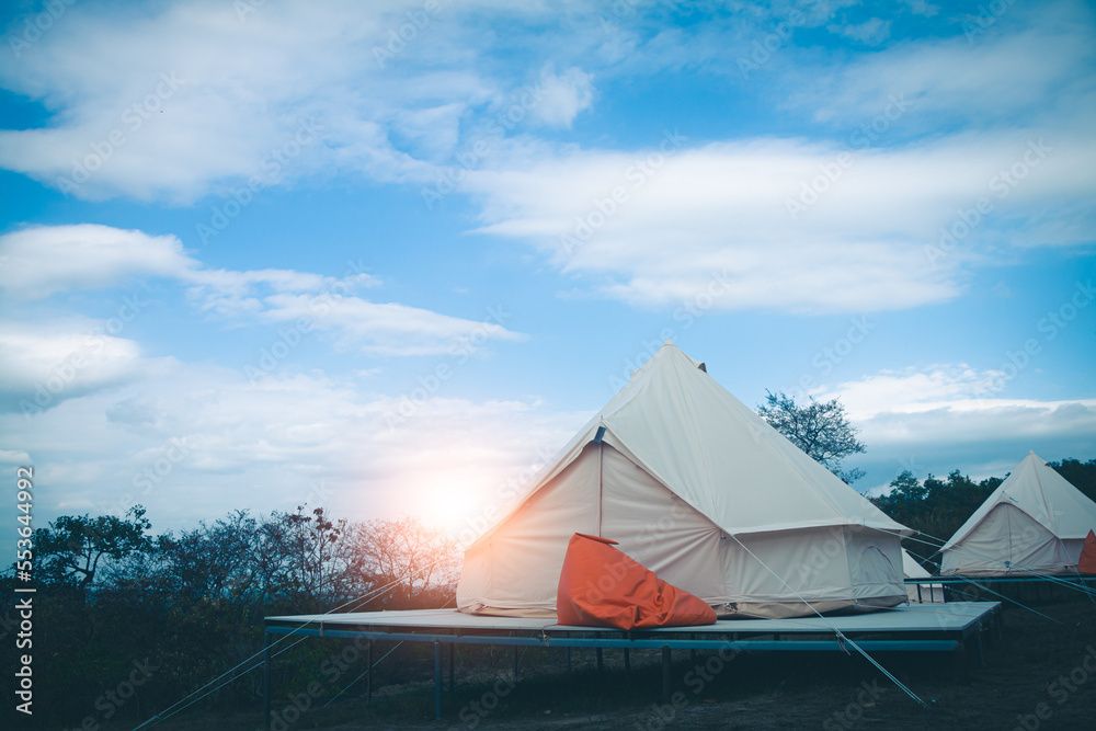 Sunshine in the morning with a camping in the woods.