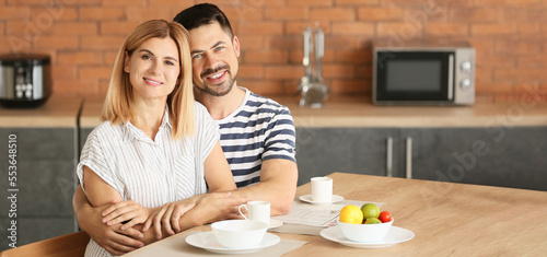 Happy middle-aged couple ha...