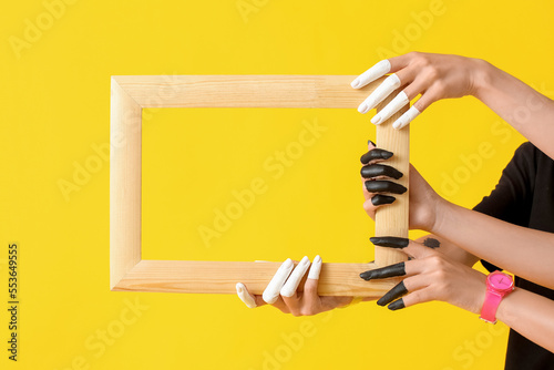 Female hands with wooden fr...