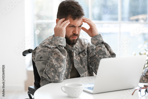 Stressed young soldier in w...