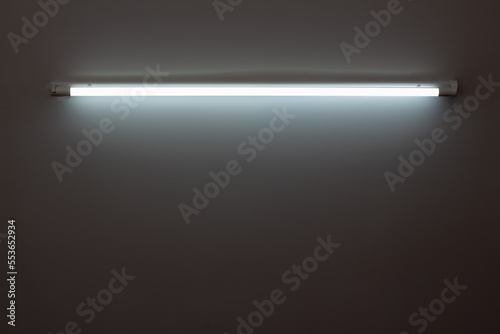 White neon lamp on a white wall