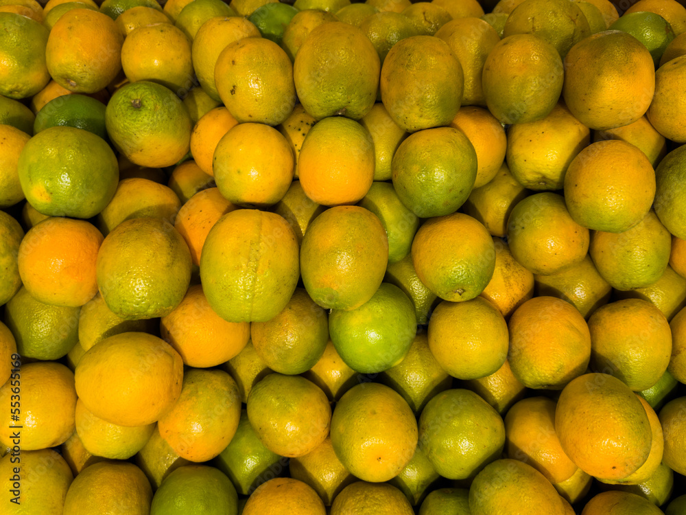 Fresh orange in the supermarket. Vegetables and fruits exposed for consumer choice. Brazilian hortifrutti. Top view.
