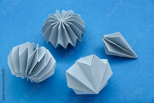 Paper Christmas balls on bl...