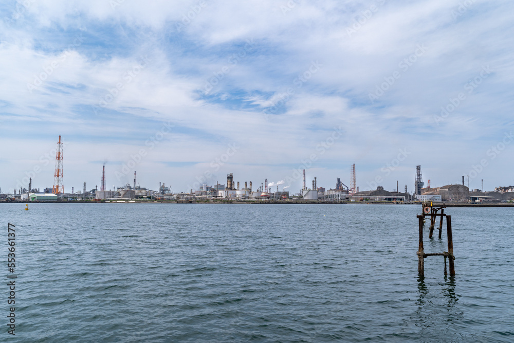 factories are on the opposite bank of the sea in Kitakyushu city Japan. factories are on the opposite bank of the sea in Kitakyushu city Japan.