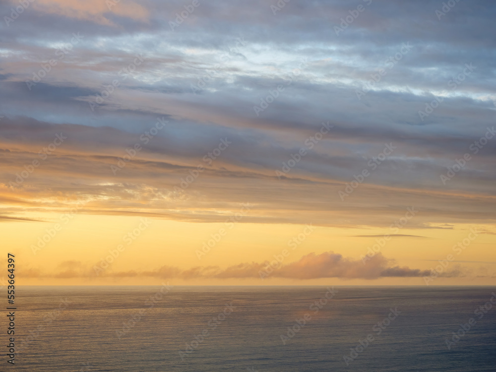 Sunset clouds over Tasman sea