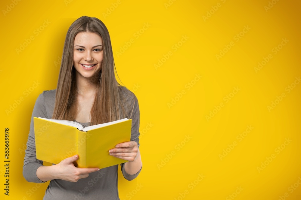 Young smart student with books, university concept Young smart student with books, university concept