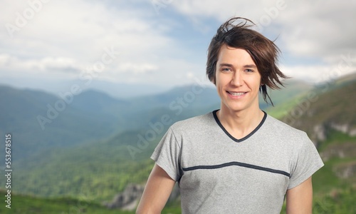 Young handsome man posing outdoor. © BillionPhotos.com