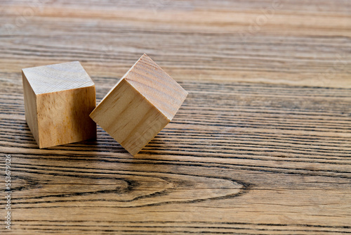 Two wooden blocks on the table