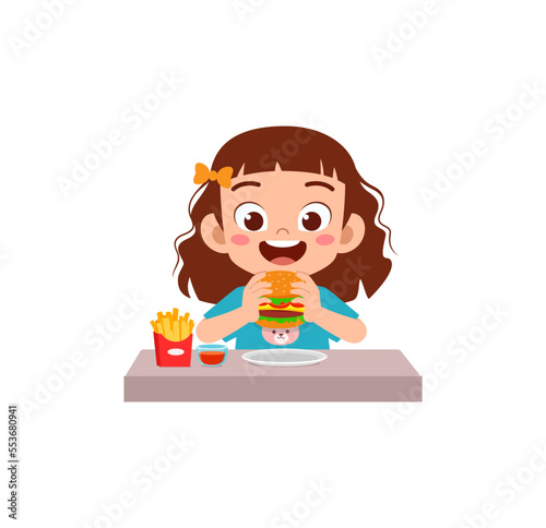 little kid eat hamburger and feel happy