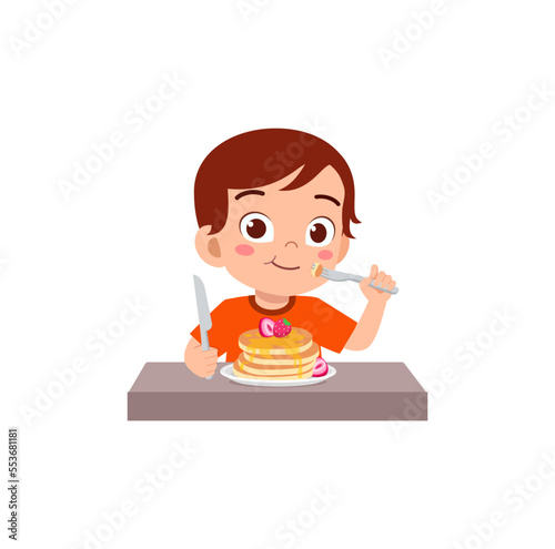 little kid eat pancake and feel happy