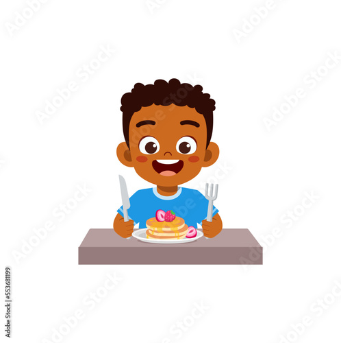 little kid eat pancake and feel happy