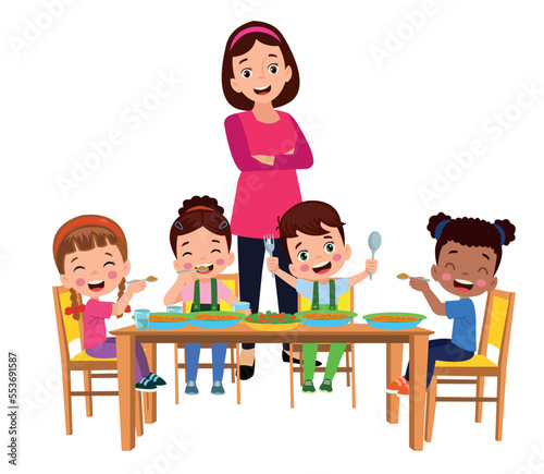 cute little boy eating at the dinner table