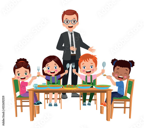 cute little boy eating at the dinner table
