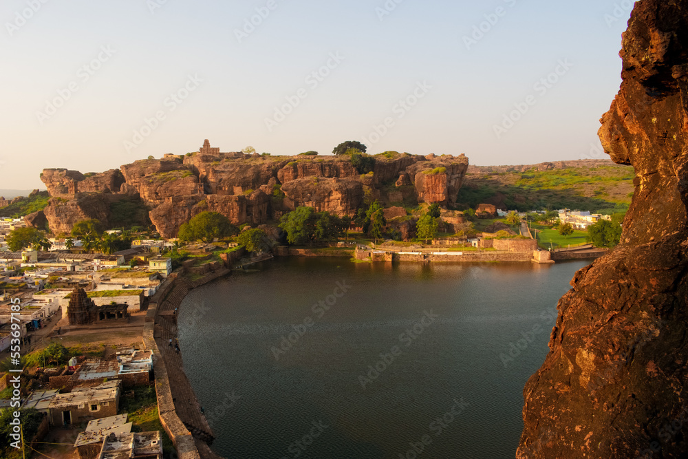 Panoramic view of Badami cave temples,sandstone mountains with agasthya lake.