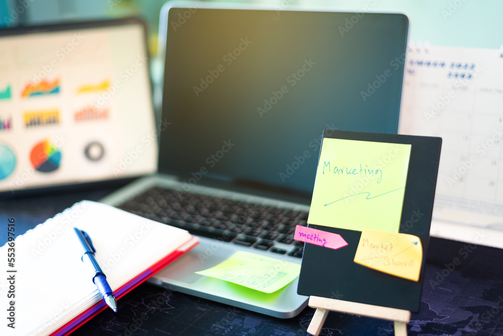 Write a note on the desk of the marketing officer. Write a note on the desk of the marketing officer.