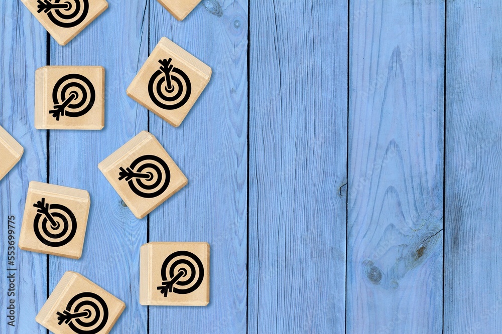 Fototapeta premium Image of target on wooden cubes blocks