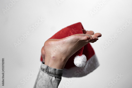 woman feet and soles with christams hat close-up