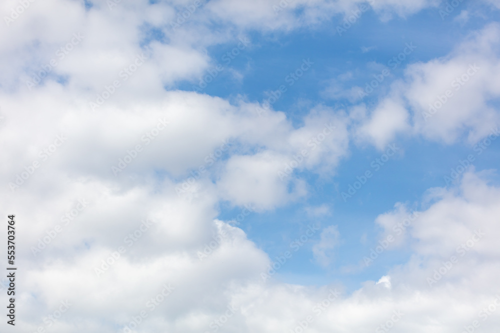 White clouds on the blue sky as a background. White clouds on the blue sky as a background.