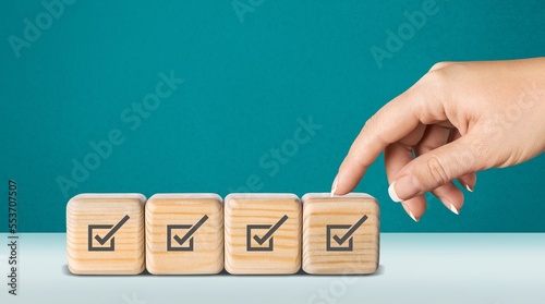 Checklist concept, Check image on wooden cubes or blocks