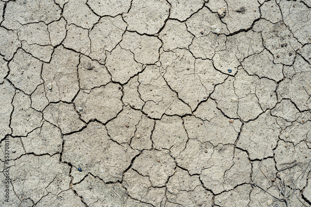 Brown dry soil or desert cracked ground texture background,land arid earth warming. Brown dry soil or desert cracked ground texture background,land arid earth warming.
