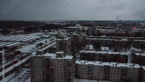 Stormy winter clouds above Kaunas city living district, aerial view photo