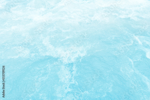 Defocus blurred transparent white colored clear calm water surface texture with splashes and bubbles. Trendy abstract nature background. Water waves in sunlight with copy space. White water shinning 